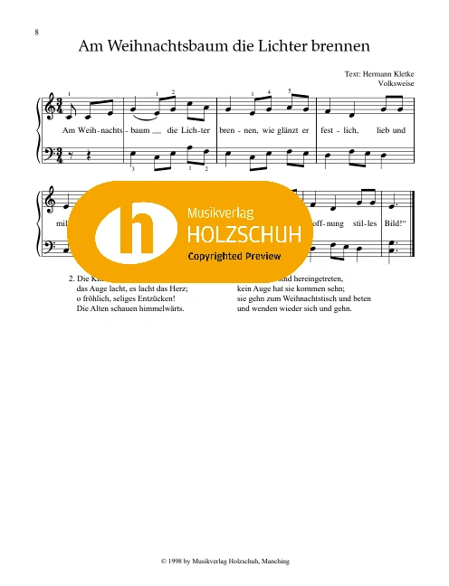 Am Weihnachtsbaum die Lichter brennen